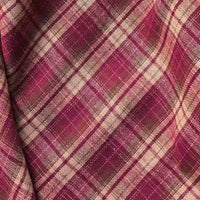 Close-up of Longan Craft’s Colorful One Side Sueded Flannel Fabric by the yard, featuring a super snuggle yarn dyed cotton plaid design in red, pink, and beige. The image highlights the intersecting lines and the soft, textured surface of this fall flannel material.