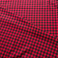 The Colorful One Side Sueded Flannel Fabric by the Yard from Longan Craft features a yarn dyed cotton plaid design in classic red and black checks, with a vibrant pattern and a soft texture that’s beautifully highlighted by a diagonal fold near the center.