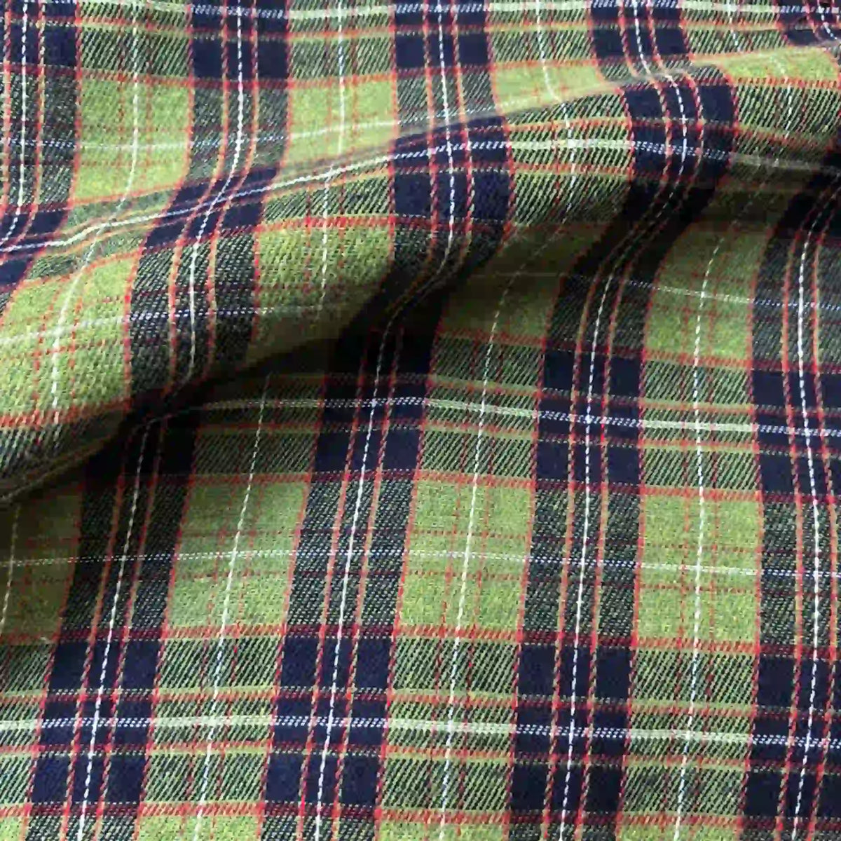 Here’s a revised sentence using your product data: The Longan Craft Colorful One Side Sueded Flannel Fabric By The Yard is a yarn dyed cotton plaid flannel material featuring a navy blue, red, and white tartan pattern with a touchably soft finish and subtle natural wrinkles—ideal for super snuggly fall projects.