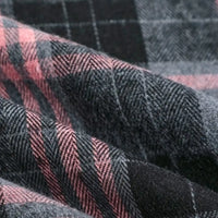 Close-up of Longan Craft’s Colorful One Side Sueded Flannel Fabric By The Yard, a super snuggle fall material featuring a yarn dyed cotton plaid pattern in pink, black, and gray. The fabric shows its cozy texture and soft folds.