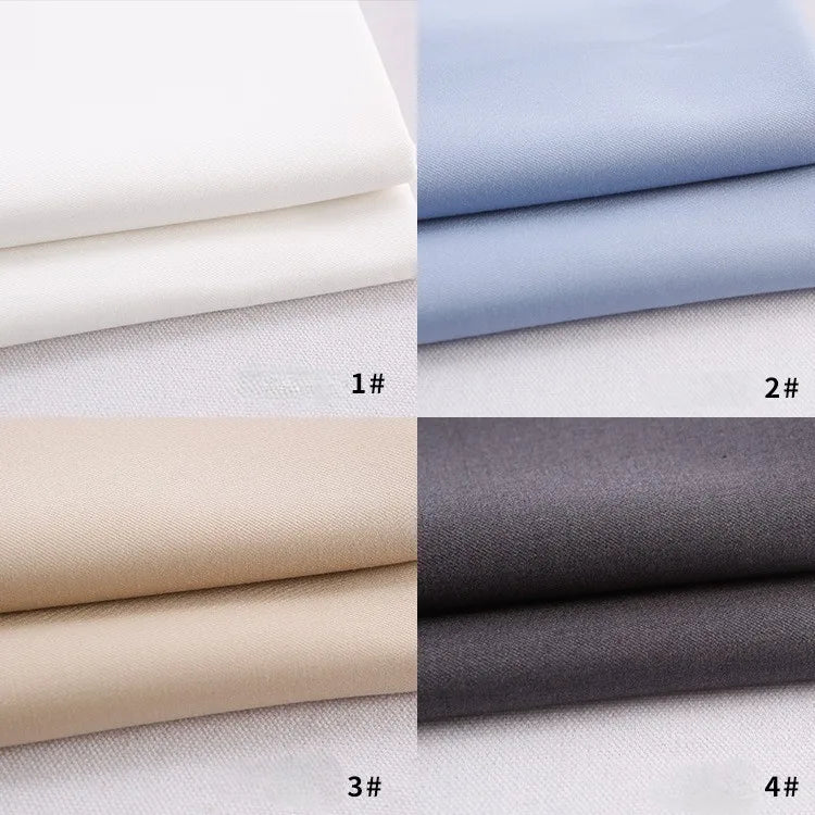Four stacks of Longan Craft Colorful Rayon Polyester Blend Gabardine Fabric: white (1#, top left), light blue (2#, top right), beige (3#, bottom left), and dark gray (4#, bottom right)—ideal for DIY uniforms.