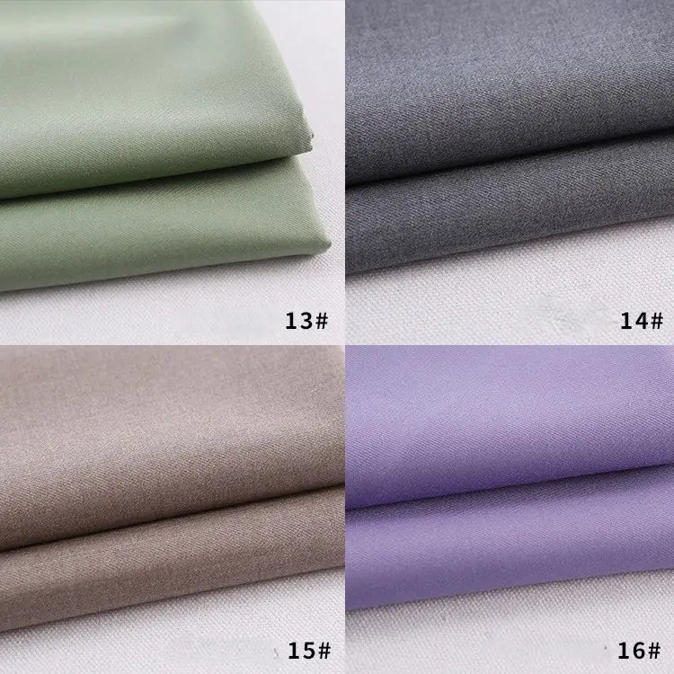 Four folded Longan Craft Colorful Rayon Polyester Blend Gabardine fabrics in light green (13#), gray (14#), taupe (15#), and lavender (16#) are displayed, each with a number label on the bottom right corner.
