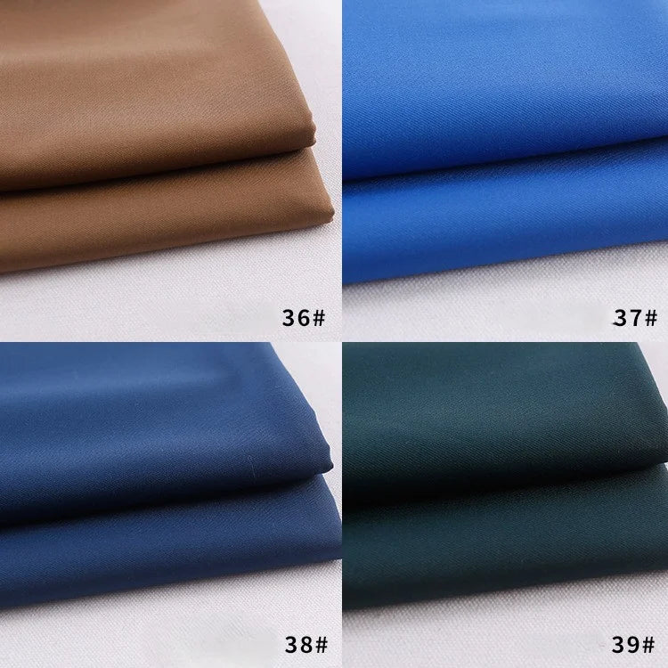 Four stacks of Longan Craft’s Colorful Rayon Polyester Blend Gabardine Fabric in brown (36#), bright blue (37#), navy blue (38#), and dark green (39#), each labeled by number on a white background.