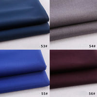 Four rayon polyester gabardine fabric swatches by Longan Craft—dark navy (53#), grey (54#), royal blue (55#), and burgundy (56#)—highlight this heavyweight, versatile material ideal for DIY uniforms and creative projects.