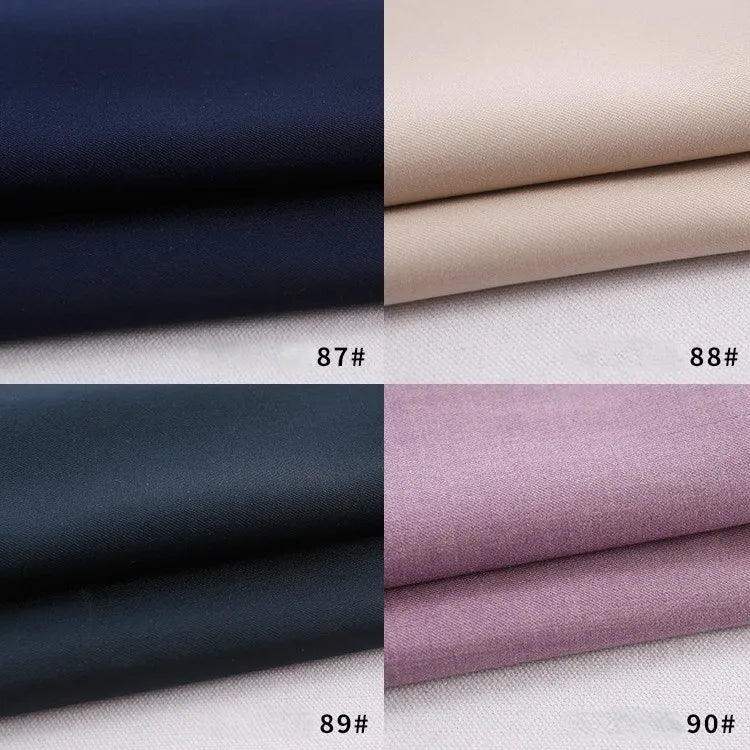 Four swatches of Longan Craft's Colorful Rayon Polyester Blend Gabardine Fabric are shown in dark navy (87#), beige (88#), dark charcoal (89#), and light mauve (90#), each displayed separately. Perfect for DIY uniforms.