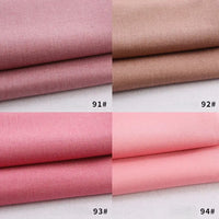 Four stacks of Longan Craft Colorful Rayon Polyester Blend Gabardine Fabric By The Yard in pink and brown shades, labeled 91#, 92#, 93#, and 94#, are displayed neatly in a 2x2 grid—great for DIY uniforms.