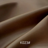 A close-up of Longan Craft’s Colorful Satin Viscose Fabric by the Yard, a polyester-viscose material with twill weave, showcasing its smooth texture and subtle sheen—ideal for creating elegant formal dresses.