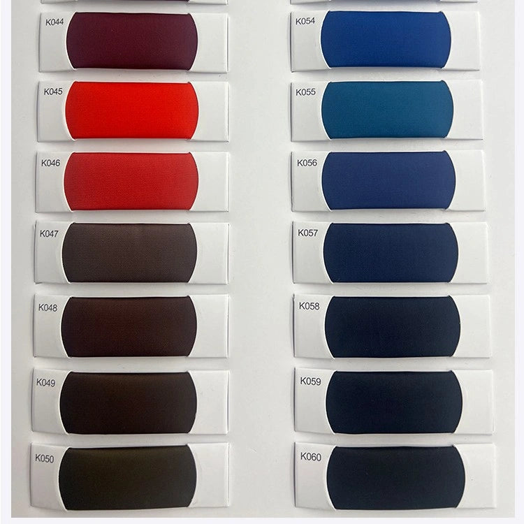 Longan Craft's Colorful Satin Viscose Fabric By The Yard is displayed as labeled swatches on white cards—warm burgundy to brown shades on the left, cool blue to navy tones on the right—perfect for elegant formal dresses.