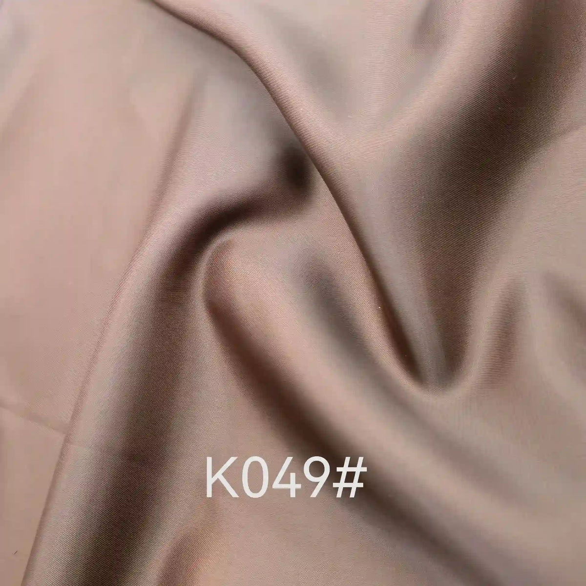 A close-up of Longan Craft's Colorful Satin Viscose Fabric by the yard, a polyester viscose material with a twill weave, showcasing its smooth texture and vibrant hues—perfect for elegant formal dresses.