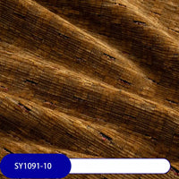 Close-up of Longan Craft Colorful Slub Chenille Fabric by the Yard, showing its slubby textured heavyweight chenille and soft folds. A label at the bottom left displays SY1091-10 on a blue and white background. Ideal for home decor upholstery.
