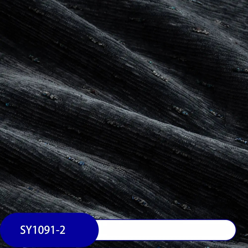 Close-up of Colorful Slub Chenille Fabric By The Yard from Longan Craft, showing ribbed, slubby textured heavyweight chenille with soft speckled upholstery and subtle lines. A blue label at the bottom left reads SY1091-2.