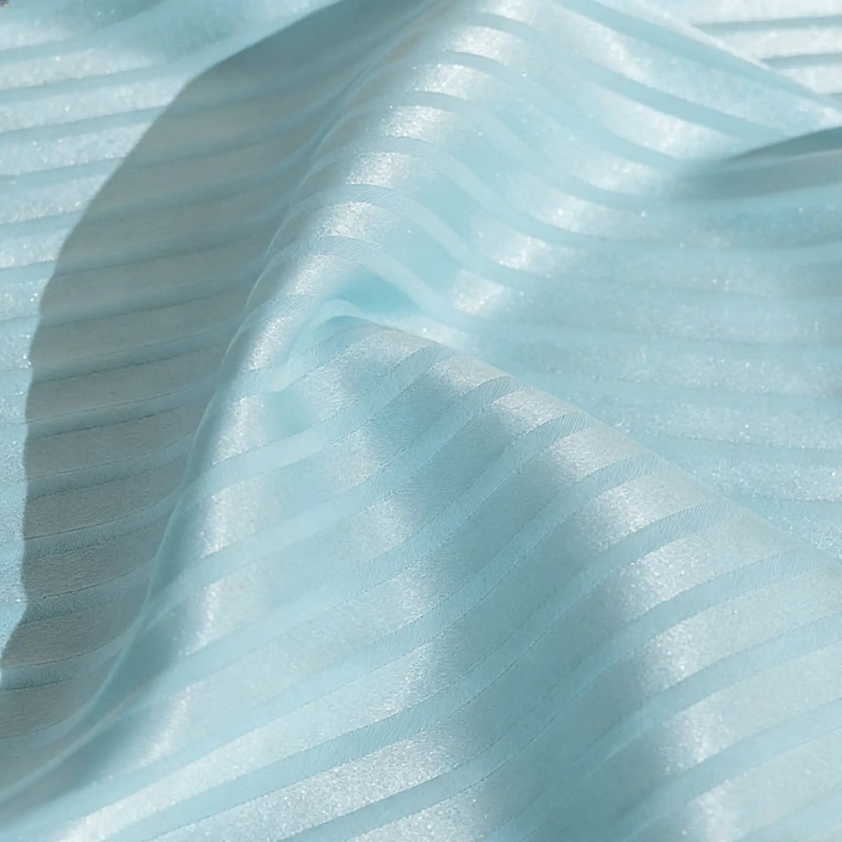 Longan Craft’s Colorful Striped Jacquard Satin Fabric By The Yard features shiny polyester stripes and a smooth, breathable texture—ideal for dressmaking or décor accents needing elegant, light-reflective satin material.