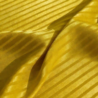 Close-up of Longan Craft Colorful Striped Jacquard Satin Fabric By The Yard, a smooth and breathable shiny polyester material with alternating glossy and matte stripes, softly draped to highlight its vibrant texture for dressmaking.