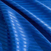 Longan Craft’s Colorful Striped Jacquard Satin Fabric by the yard features a shiny, smooth polyester with wavy diagonal stripes that reflect light, creating a glossy finish—ideal for dressmaking and other creative projects.