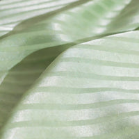 Close-up of Longan Craft's Colorful Striped Jacquard Satin Fabric By The Yard—shiny polyester with smooth, breathable alternating matte and glossy stripes, perfect for elegant dressmaking.