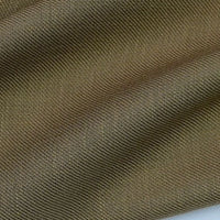 A close-up of Longan Craft's Colorful Twill Lyocell Fabric shows its sustainable 100% Lyocell material, with fine horizontal ribbing and gentle folds that form a wavy, textured pattern—perfect for comfortable suits.