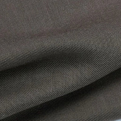 Close-up of Colorful Twill Lyocell Fabric By The Yard from Longan Craft, featuring a dark gray ribbed pattern and soft folds that highlight the detail and quality of this sustainable 100% lyocell textile, ideal for suits.