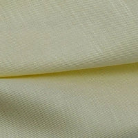 Close-up of Longan Craft’s Colorful Twill Lyocell Fabric—100% lyocell with a subtle textured pattern and fine horizontal lines, slightly folded to show depth. Sustainable textile by the yard, perfect for comfortable suits.