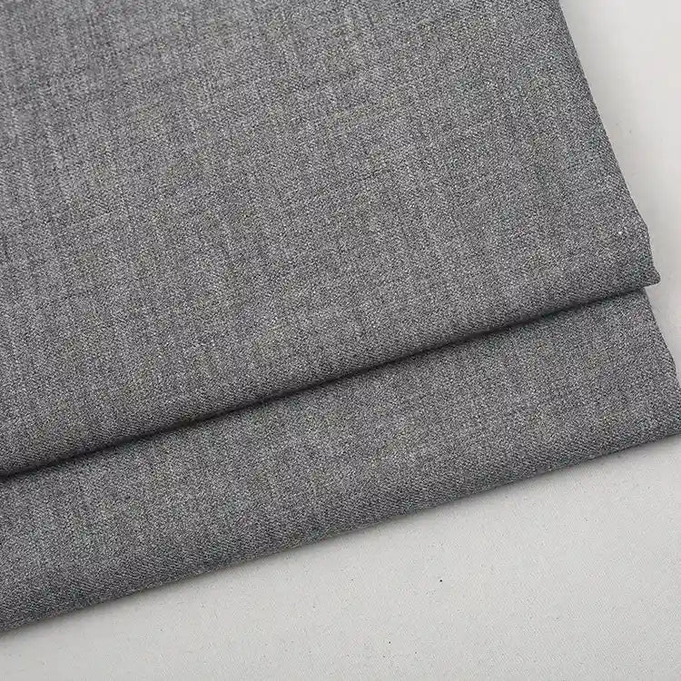 A folded piece of Colorful Worsted Wool Fabric By The Yard, featuring premium multicolor wool with a fine weave.