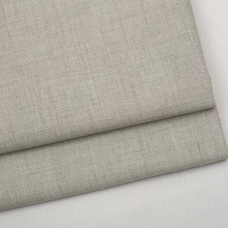 Folded piece of light gray, textured Colorful Worsted Wool Fabric By The Yard.