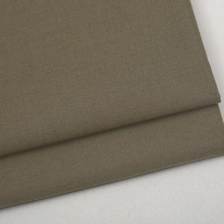 Olive green, premium Colorful Worsted Wool Fabric By The Yard folded over.