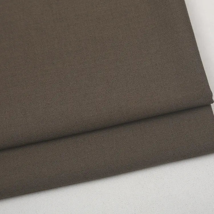 Folded piece of premium dark brown Colorful Worsted Wool Fabric By The Yard.