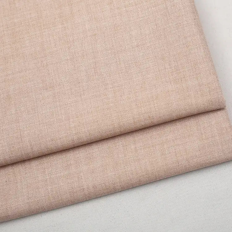 Folded piece of light pink Colorful Worsted Wool Fabric By The Yard, made of premium worsted wool.