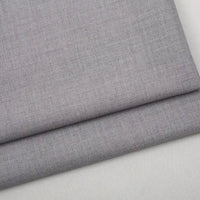 Light gray multicolor Colorful Worsted Wool Fabric By The Yard folded over itself.