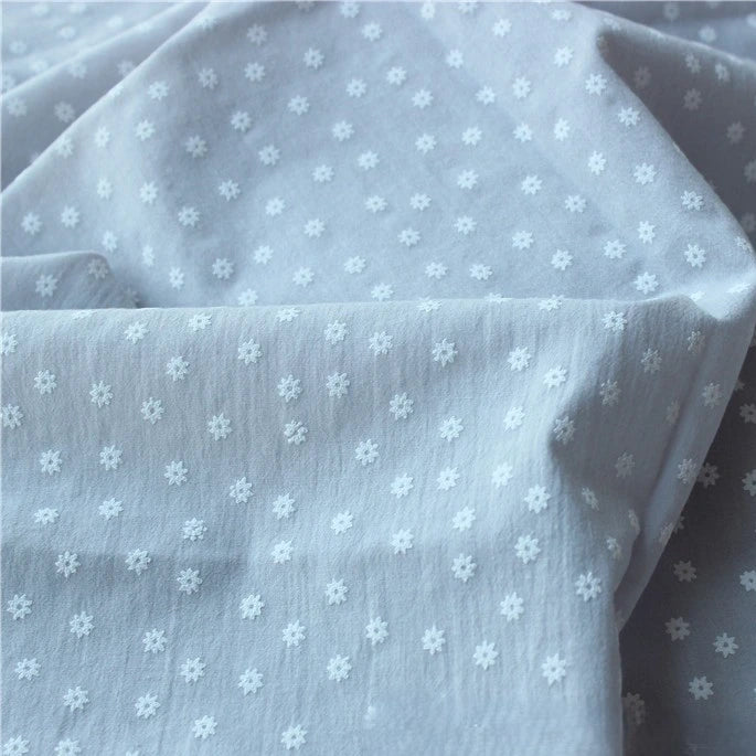 Longan Craft's Cotton Floral Printed Voile Fabric by the yard features a multicolor washed flower print on lightweight, breathable cotton—ideal for cozy, casual wear and airy garments.