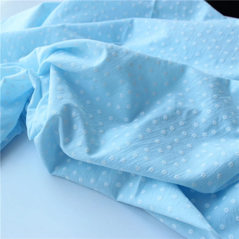 Longan Craft’s Cotton Floral Printed Voile Fabric By The Yard features a multicolor washed flower print. This soft, breathable, lightweight voile is ideal for cozy casual wear and delicate projects.