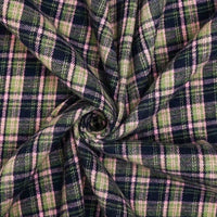 Cotton Gingham Sueded Flannel Fabric By The Yard by Longan Craft, featuring a multicolor polyester checked pattern, is tightly swirled at the center to showcase the flannel’s comfy texture and vibrant design.