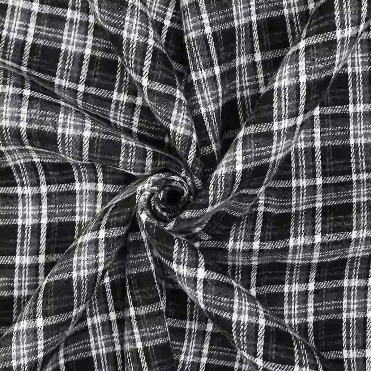 Longan Craft’s Cotton Gingham Sueded Flannel Fabric by the Yard is displayed here in a twisted spiral, showcasing its intersecting multicolor checked pattern and comfy, textured flannel material.