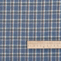 Longan Craft Cotton Gingham Sueded Flannel Fabric by the Yard in a multicolor plaid pattern—featuring blue, gray, and white checked polyester—with a wooden ruler at the bottom right for scale (up to 8 inches), showing the fabric’s pattern size; ruler marked “Made in China.”.