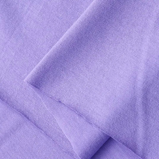 Close-up of Longan Craft’s Cotton Jersey Fabric By The Yard in lavender, a soft and lightweight single jersey material with a smooth texture, ideal for making breathable, casual wear.