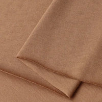 Close-up of Longan Craft Cotton Jersey Fabric By The Yard reveals its soft texture, smooth edges, and uniform color. This colorful single jersey material is breathable and ideal for making casual wear.