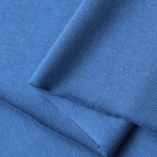 Close-up of Longan Craft’s Cotton Jersey Fabric By The Yard—a colorful, soft single jersey material with a fine knit pattern. This 100% cotton fabric is smooth, breathable, and perfect for making casual wear.