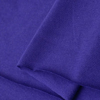 Close-up of Longan Craft's Cotton Jersey Fabric By The Yard—smooth, soft, and breathable single jersey material, ideal for making casual wear in vibrant purple.