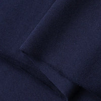 Close-up of Longan Craft’s Cotton Jersey Fabric By The Yard, a neatly folded, navy blue, colorful single jersey material with a smooth texture and breathable qualities—perfect soft jersey fabric for making casual wear.
