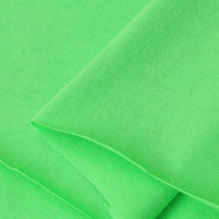 Close-up of Longan Craft's Cotton Jersey Fabric By The Yard—a soft, smooth, and bright green single jersey material with fine knit details, perfect for casual wear.