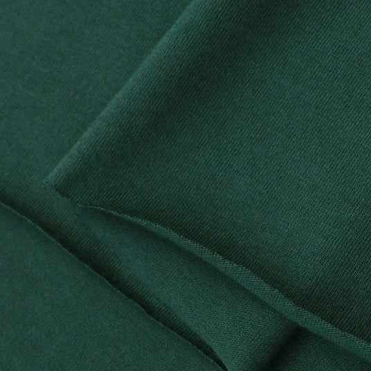 Close-up of Longan Craft Cotton Jersey Fabric by the Yard, a colorful, soft 100% cotton single jersey with neatly finished edges—ideal for making comfortable casual wear.