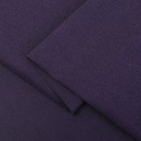 Close-up of Longan Craft’s dark purple Cotton Jersey Fabric By The Yard, neatly folded to show its smooth, slightly textured surface—perfect soft single jersey material for making colorful casual wear.