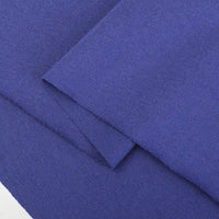 Close-up of soft, smooth royal blue Cotton Jersey Fabric by the yard from Longan Craft, layered to display texture and weave—ideal single jersey material for making casual wear.