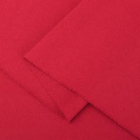 Close-up of Longan Craft Cotton Jersey Fabric By The Yard in bright red. This colorful single jersey material features a smooth, soft texture with a slightly visible weave, neatly cut edges, and is ideal for making casual wear.