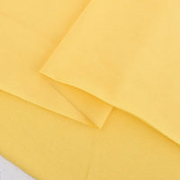 Longan Craft’s Cotton Jersey Fabric By The Yard is a colorful, soft single jersey material for casual wear. Lightweight and breathable, the fabric is neatly folded to showcase its smooth texture and inviting appearance.