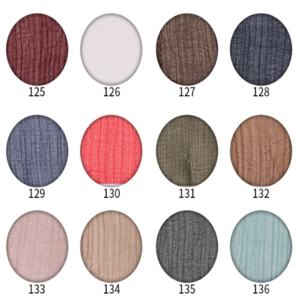 Twelve circular swatches of Longan Craft’s Crinkled Georgette Silk Fabric By The Yard, featuring solid-colored 100% Mulberry silk for luxury bridal gowns, are displayed in a 3x4 grid on a white background; each swatch is numbered from 125 to 136.