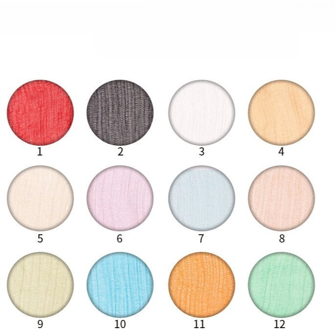 A chart displays 12 solid color circular swatches (numbered 1-12, rows of four) for Longan Craft's Crinkled Georgette Silk Fabric By The Yard—luxury 100% mulberry silk, perfect for bridal and evening gowns.