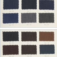 Twelve numbered Denim Color Twill Viscose Fabric swatches by Longan Craft in blue, gray, and brown shades with zigzag-cut edges—perfect for tailored trousers. Stretch elastane viscose textile shown on a white background.