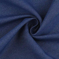 Close-up of Denim Color Twill Viscose Fabric by the yard from Longan Craft, featuring soft texture and subtle weave, twisted in a swirl to highlight its smooth surface—ideal stretch elastane viscose material for chic dressmaking.