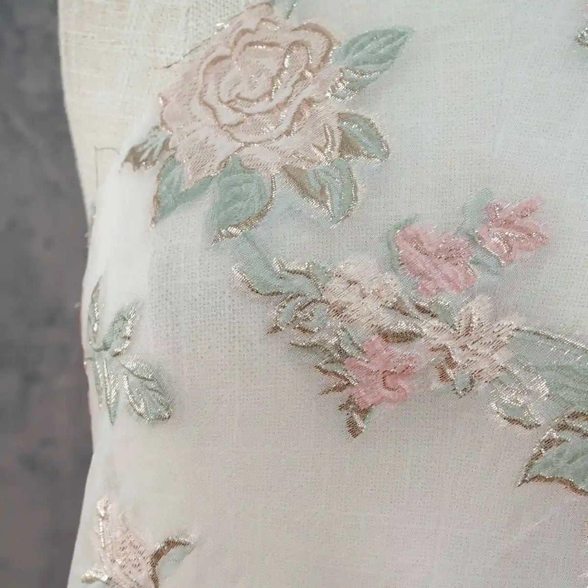 Close-up of Longan Craft's Embossed Rose Organza Fabric by the Yard—sheer, lightweight gold floral jacquard with elegant rose and leaf embroidery, perfect for vintage-inspired camisole tops.