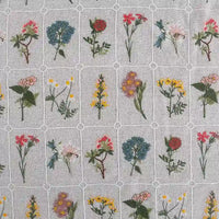 Longon Craft’s Plant Floral Embroidered Cotton Fabric By The Yard features colorful botanical embroidery in a grid pattern on soft cotton, perfect for apparel and crafts.